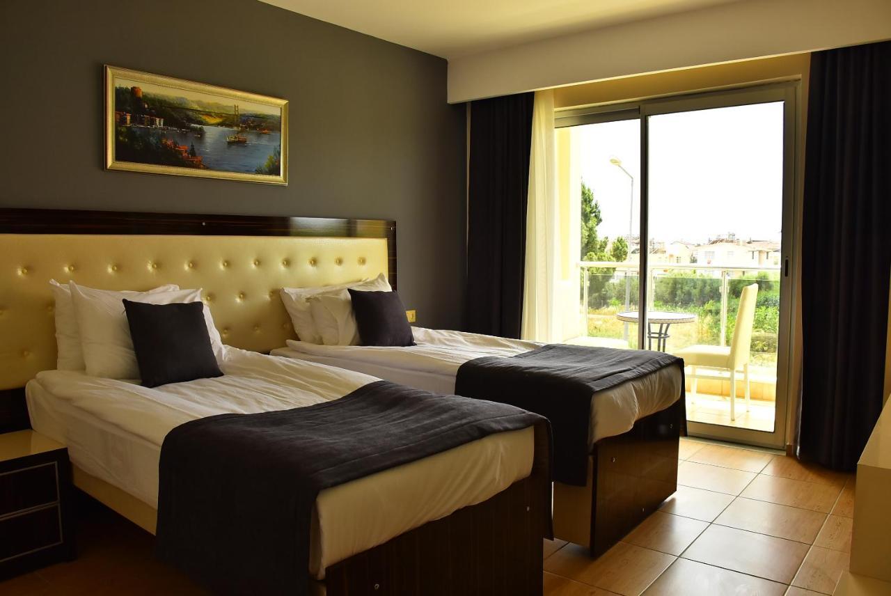 Nora Suit Hotel Side Luaran gambar